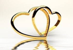 Two Golden Hearts Linked Together