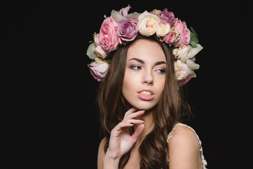 A Woman With Flowers In Her Hair