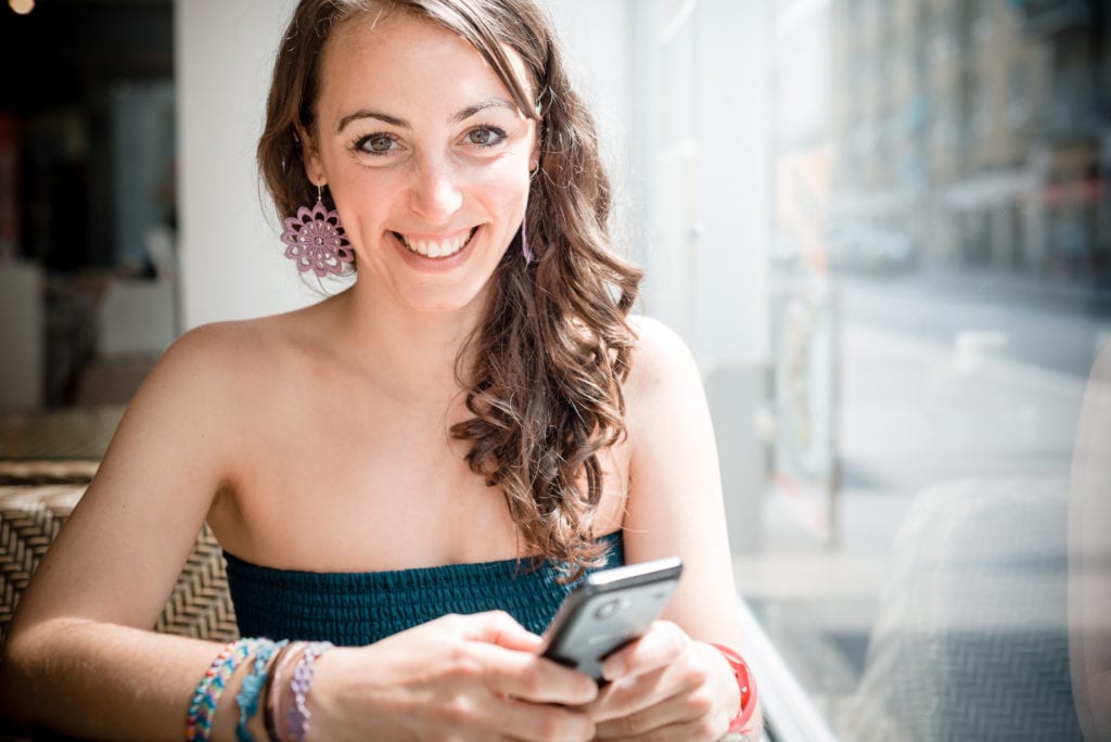 graphicstock young beautiful woman on the phone at the coffee rexffrY gZ