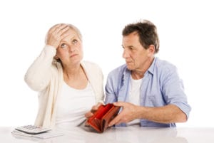 graphicstock senior couple with empty wallet discussing financial issues isolated on white background S08XkKn W