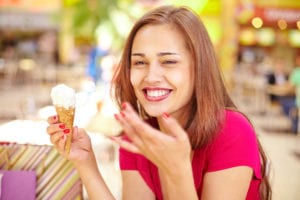 attractive woman enjoying ice cream