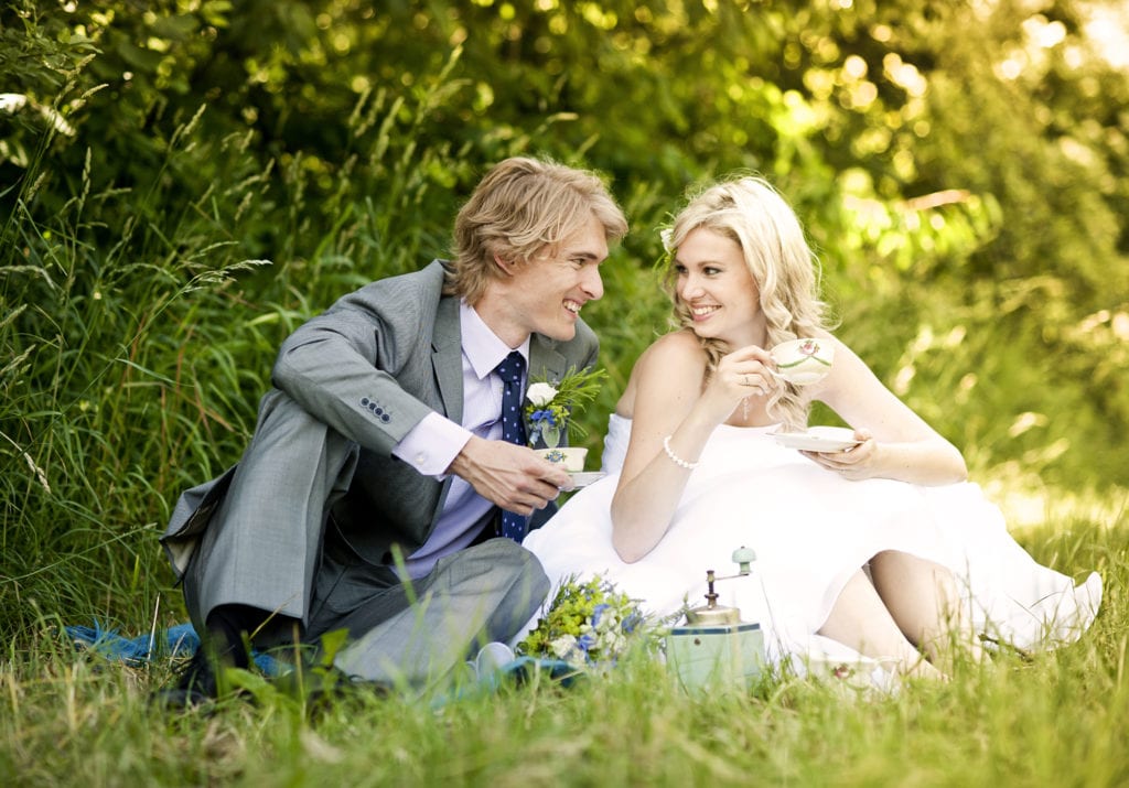 married couple on a picnic, couple in wedding dress on a picnic, marriage 