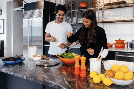 couple preparing food in the kitchen