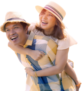 asian couple smiling while girlfriend piggybacks her boyfriend