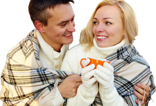 man giving woman coffee on a cold winter day