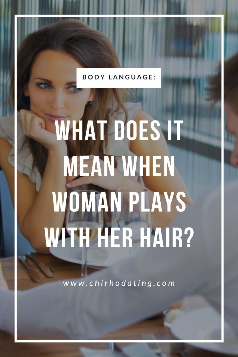 what does it mean when woman plays with he hair,