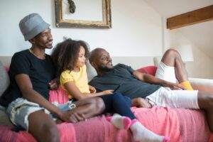 a family watching on the living room