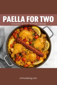 Mini chicken and chorizo paella in a small pan.