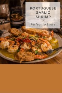 Image of Portuguese-style garlic shrimp with lemon and olive oil.