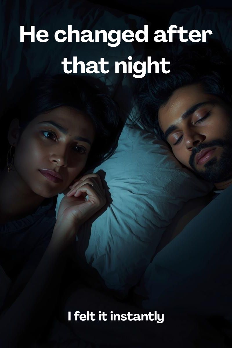an image of a worried woman in bed with a sleeping man next to her,