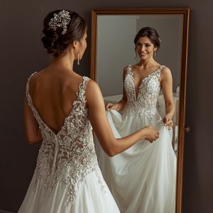 a bride watching her mirror reflection