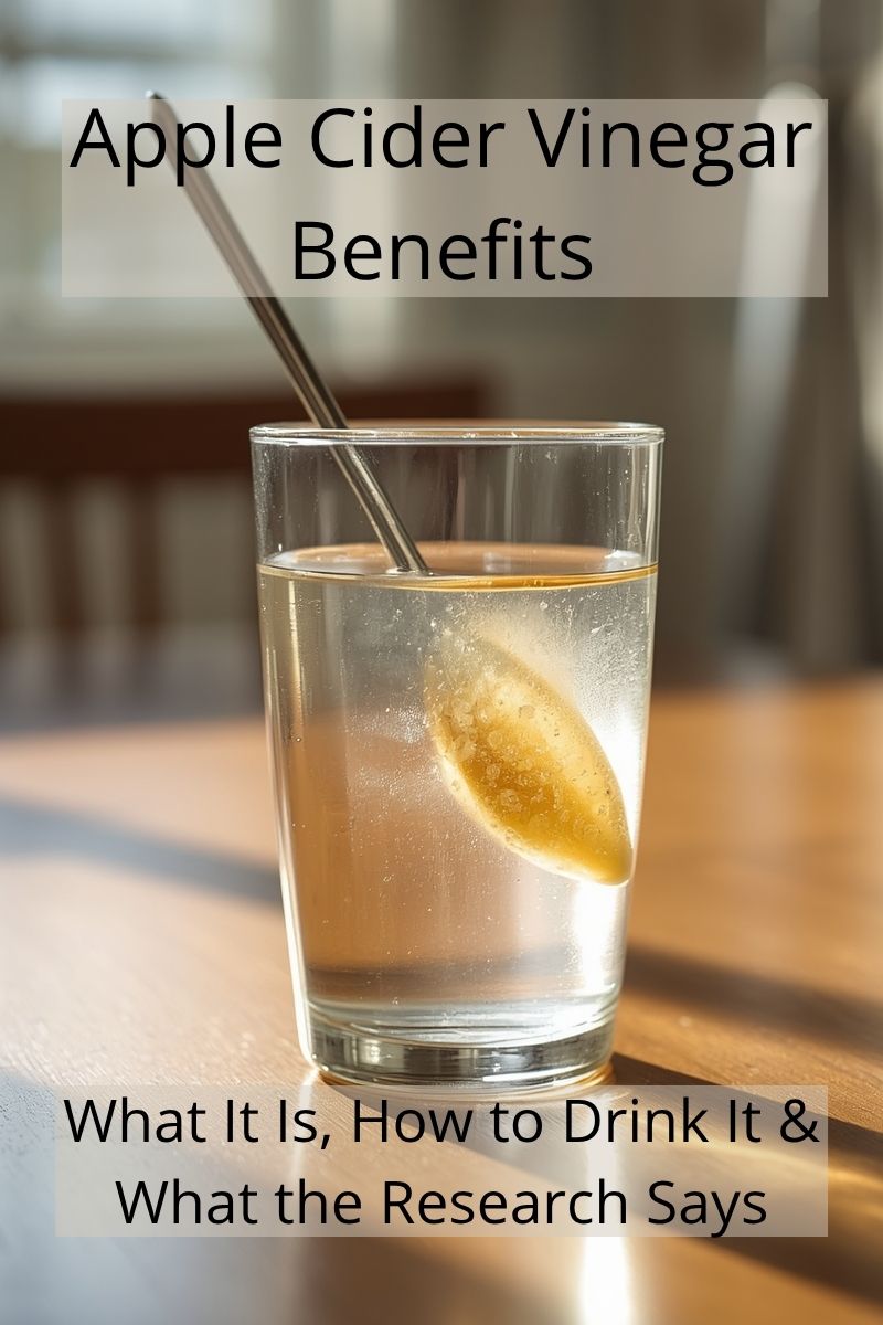 a glass filled with water and apple cider vinegar on a spoon with overlay text,